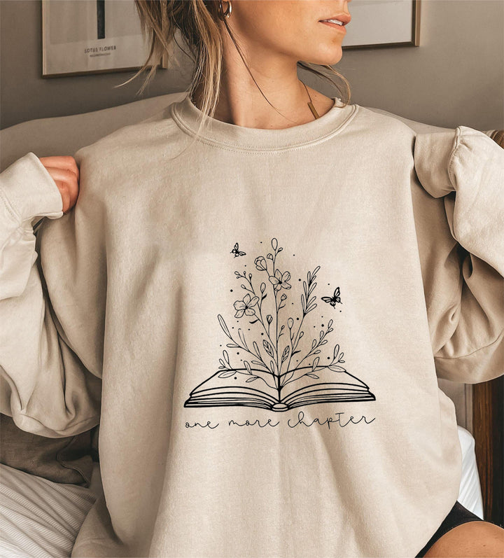 Kvinne genser med elegant blomst design og inspirerende trykk Skjora