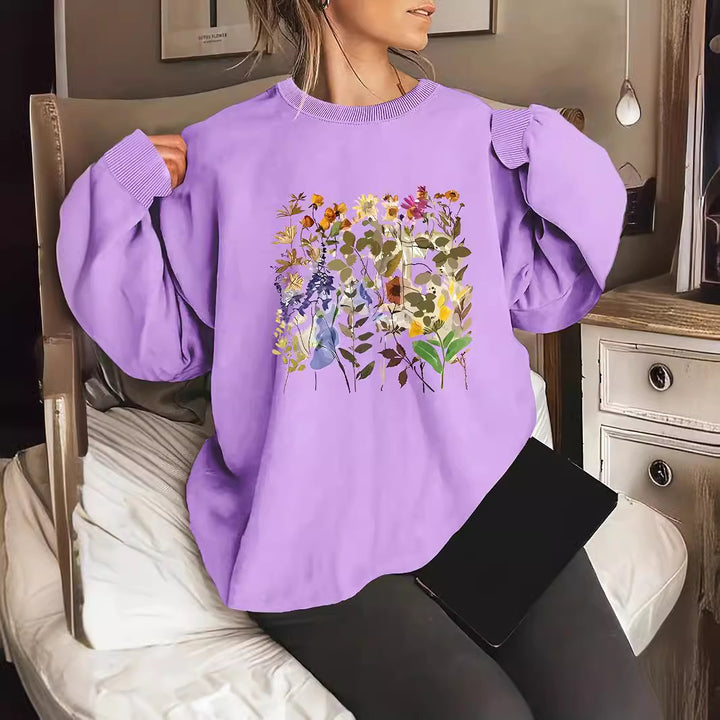 Dame sweatshirt med blomsterdesign og komfortabel passform Skjora