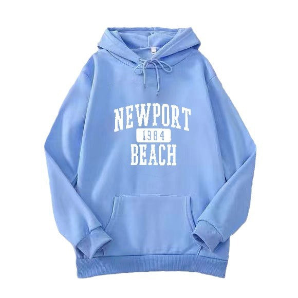 Damer hettegensere med nostalgisk Newport Beach trykk Skjora