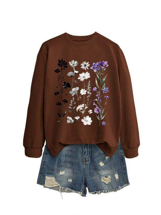 Dame sweatshirt med blomster grafisk design og myk innvendig fôr Skjora
