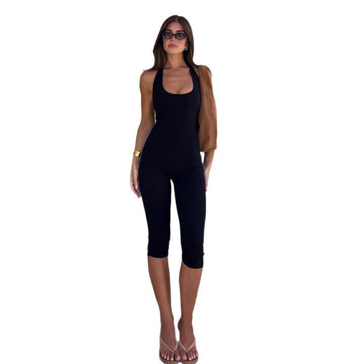 Dame Langermet jumpsuit med dyp utringning og tettsittende design Skjora
