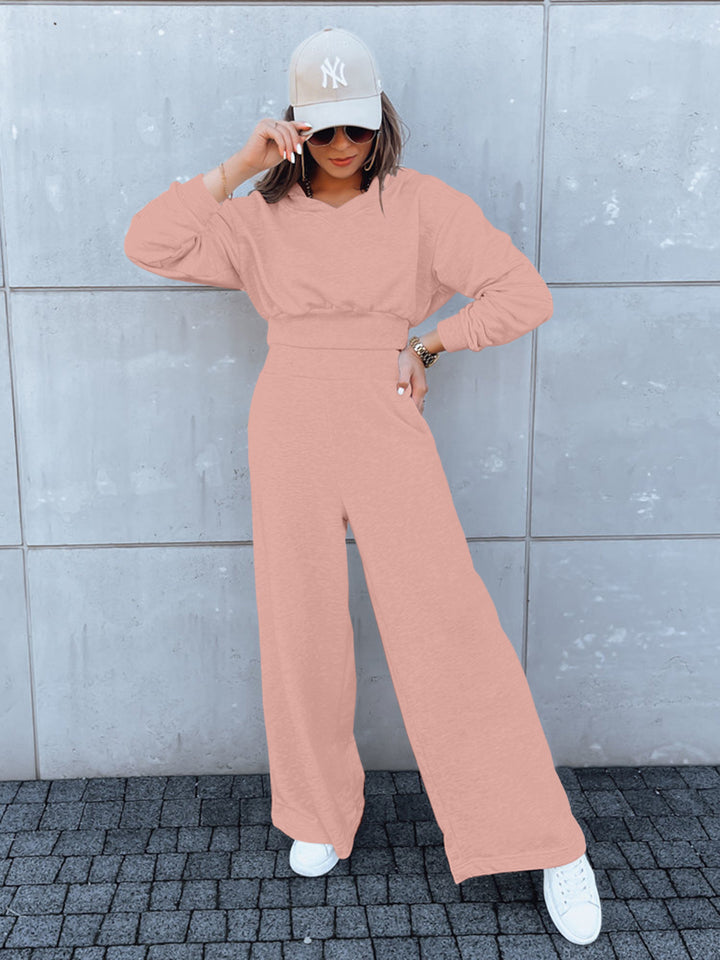 Kvinne casual jumpsuit med vide ben og praktisk hette Skjora