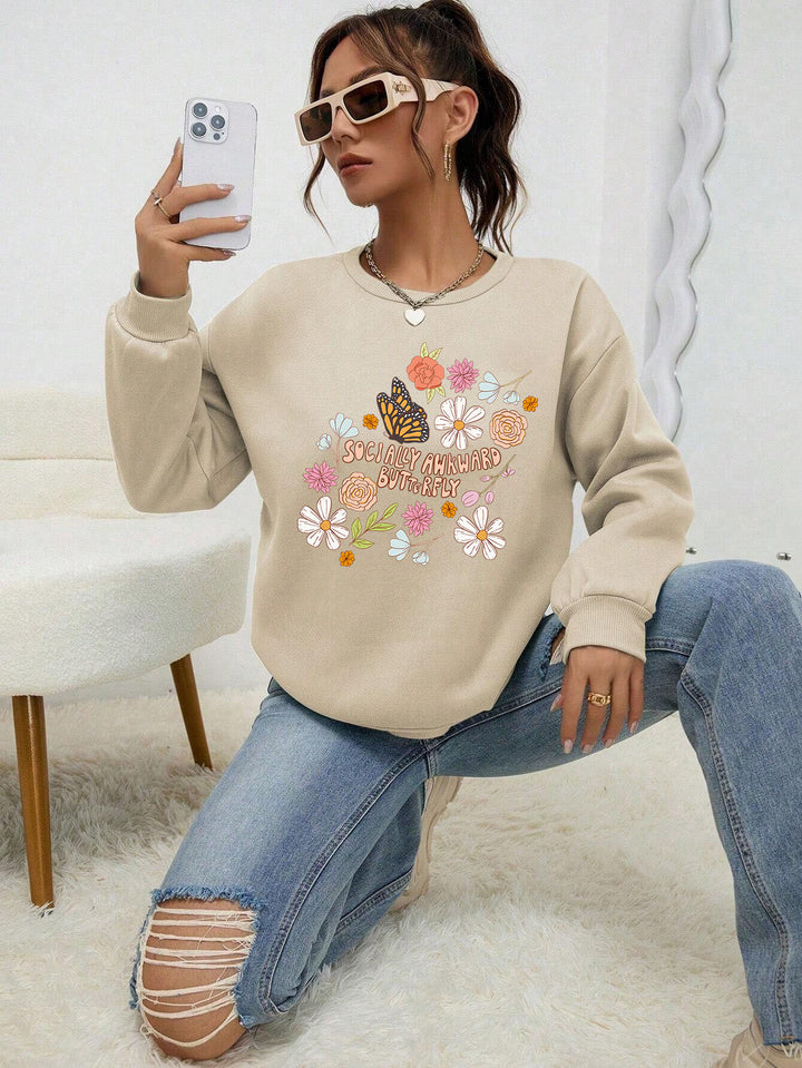 Kvinne sweatshirt med kreativt blomsterdesign og inspirerende trykk Skjora
