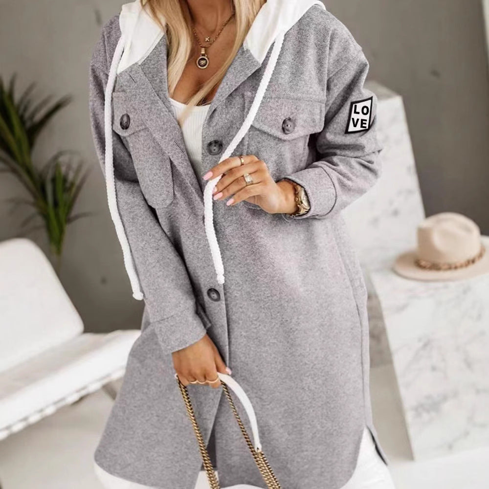 Dame Oversized Hoodie Jakke med Stilige Knappe Detaljer og Lommer Skjora