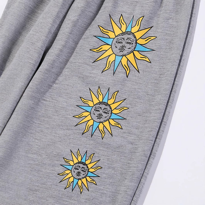 Kvinnenes komfortable joggebukser med trendy solmotiv Skjora