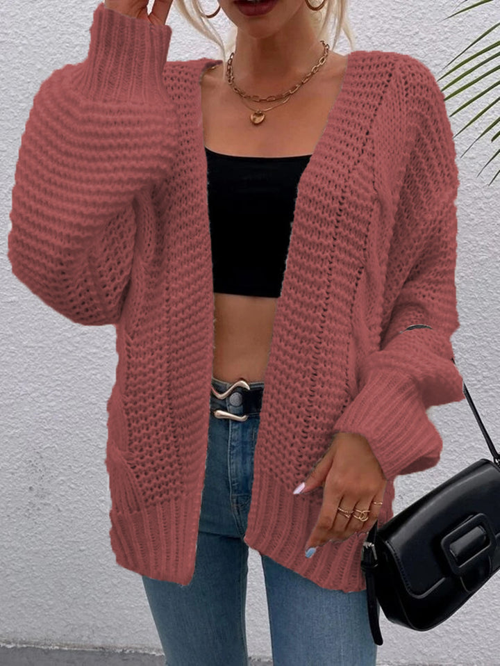Kvinnens chunky strikket cardigan med komfortable åpne lommer og avslappet passform Skjora