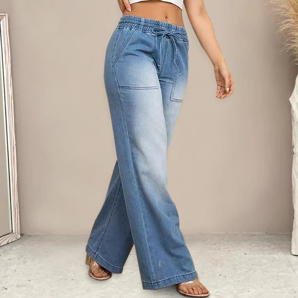Kvinners vidde jeans med elastisk midje og trendy brukt utseende