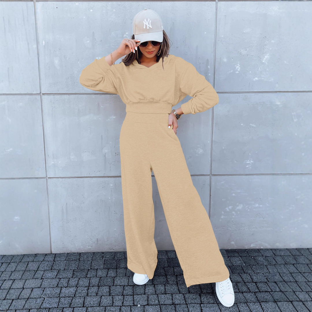 Kvinne casual jumpsuit med vide ben og praktisk hette Skjora