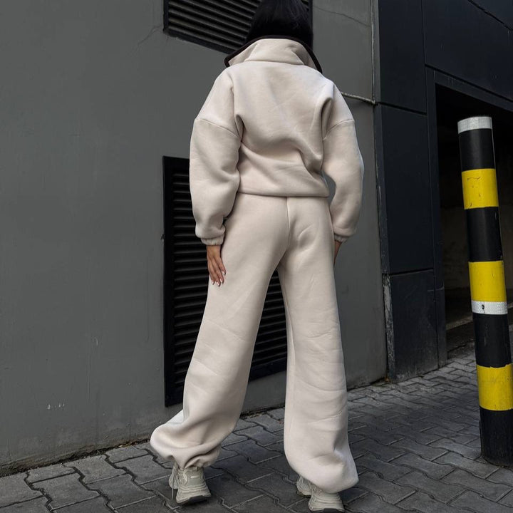 Kvinne fleece treningsdrakt med høy krage og praktiske lommer Skjora