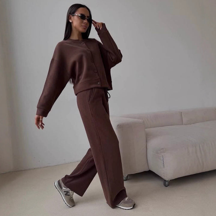 Kvinne casual hettejumpsuit med vide ben og knappdetaljer Skjora