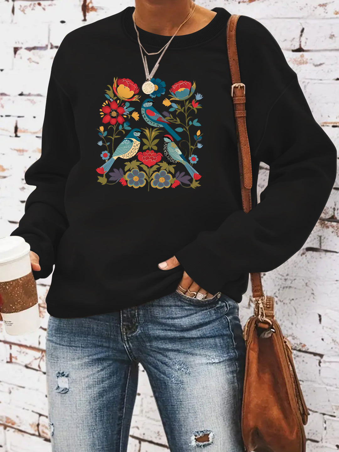 Damegenser med blomsterfuglmotiv og casual snitt Skjora