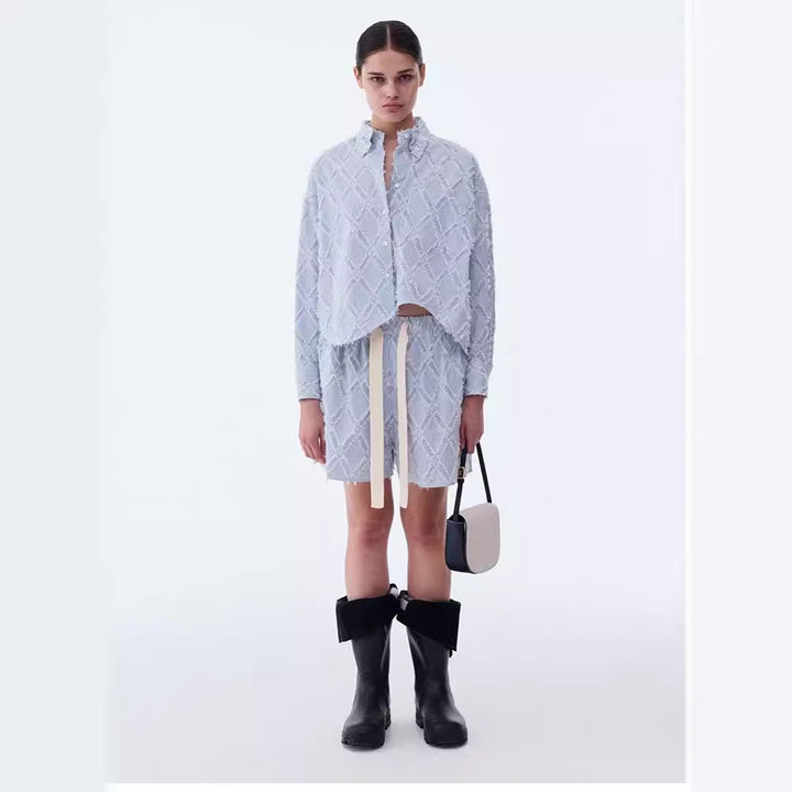 Dame casual shorts med elastisk midje og slidete mønster Skjora