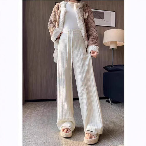 Women's loose summer trousers with elastic waist and fixed stripe pattern Skjora
