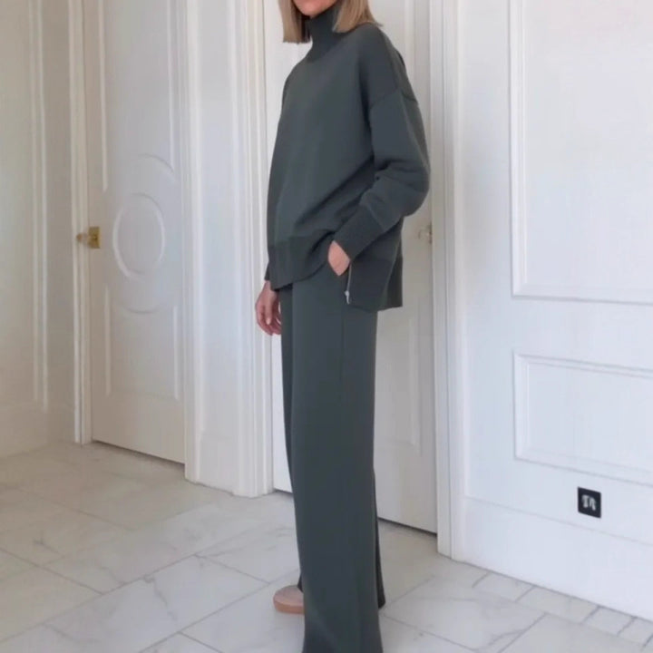 Kvinnelig komfortabel strikket loungewear-sett med høye halsgenser og vide bukser Skjora