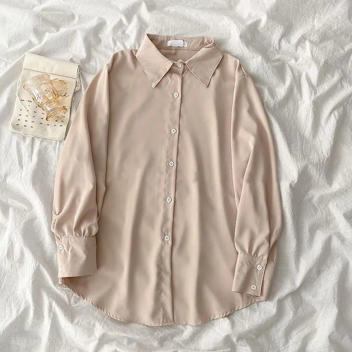 Kvinnens elegante bluse med voluminøse ermer Skjora