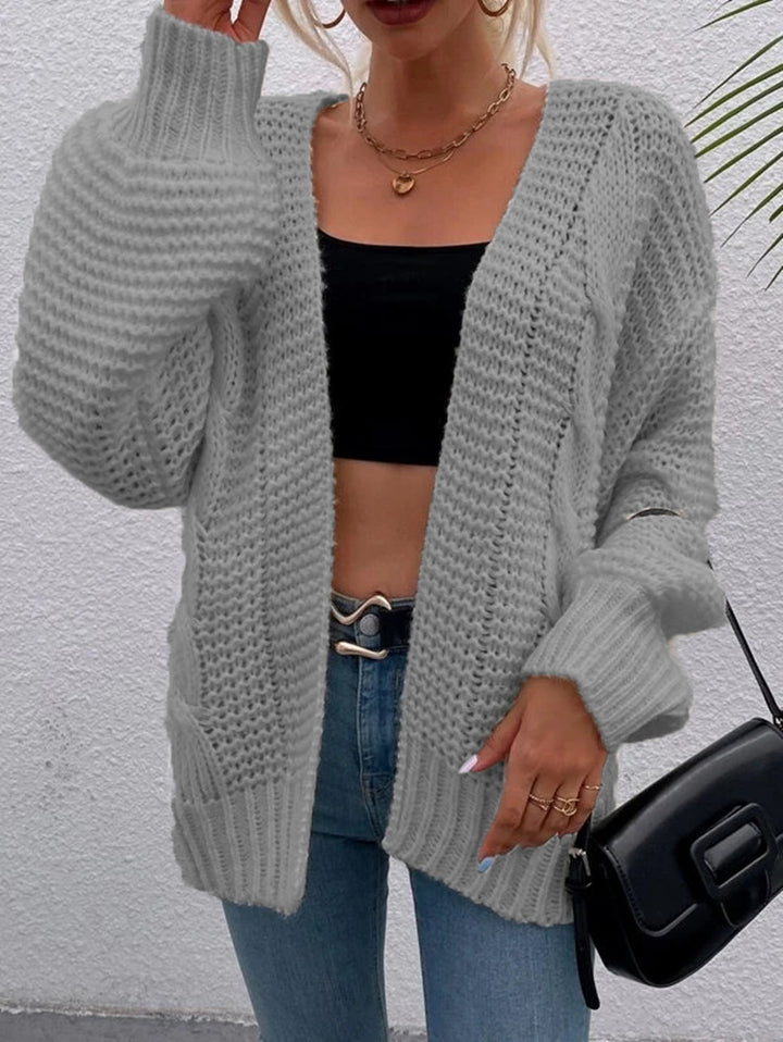 Kvinnens chunky strikket cardigan med komfortable åpne lommer og avslappet passform Skjora