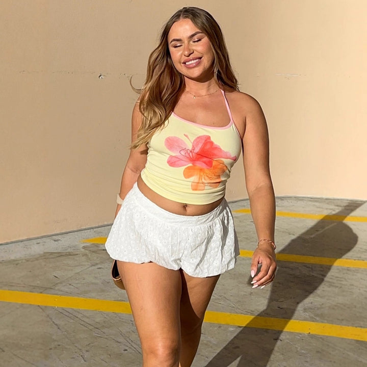 Dame Crop-Top med blomsterprint og halterneck Skjora