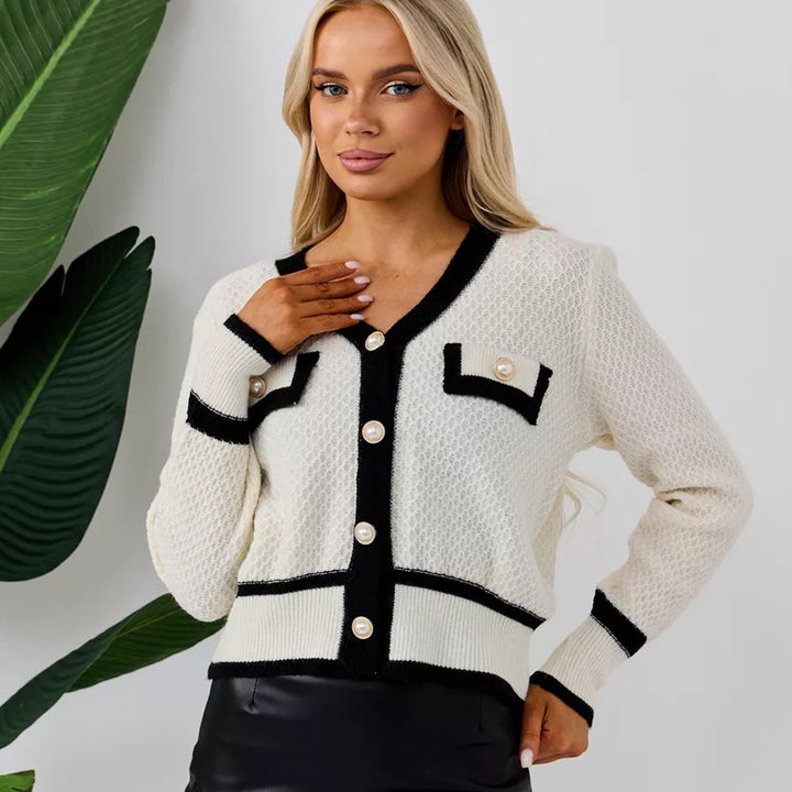 Kvinnelig moteriktig cardigan med elegante perleknapper og lommer Skjora