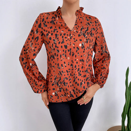 Damebluse med blomster leopardmønster og voluminøse ermer Skjora