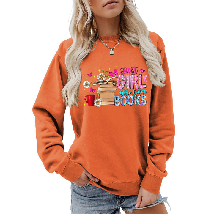 Dame sweatshirt med iøynefallende bokmotiv og ledig passform Skjora