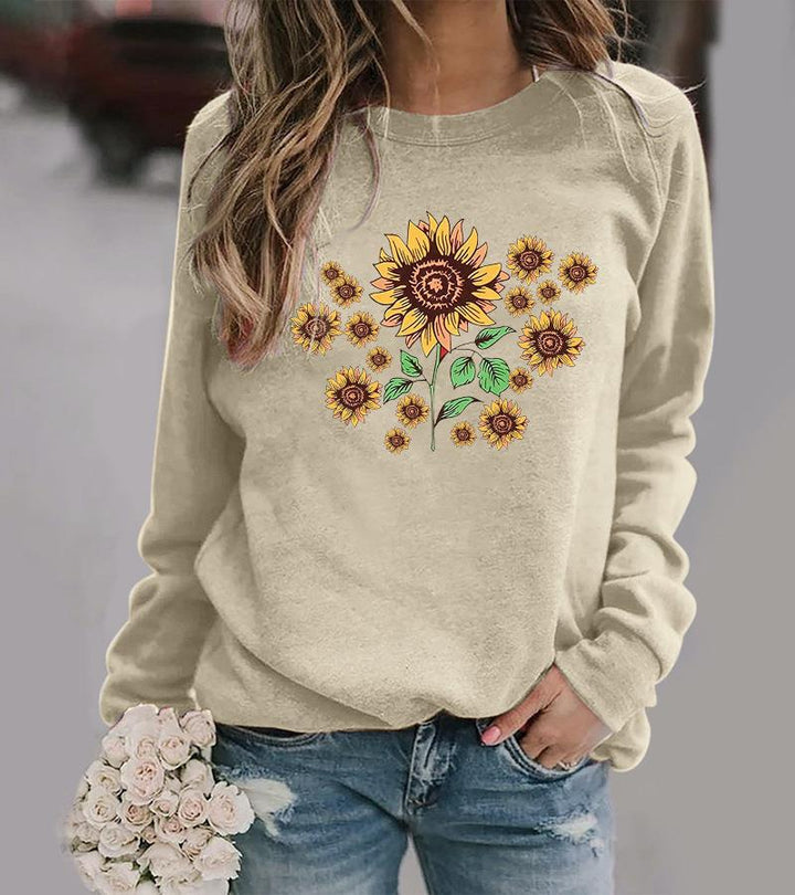 Kvinne genser med blomster solsikke motiv og behagelig passform Skjora