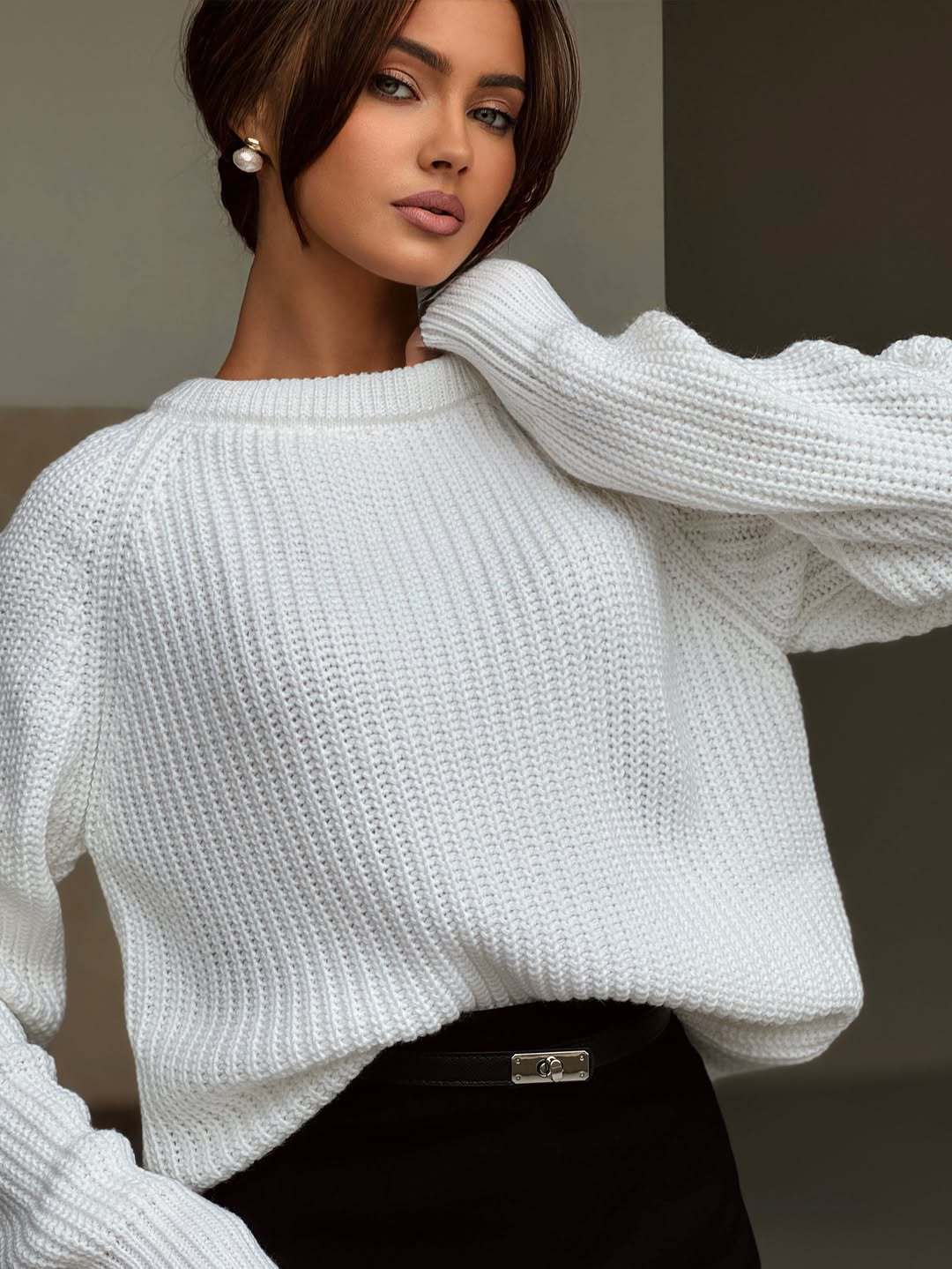 Women's knitted sweater with elegant cuffs Skjora