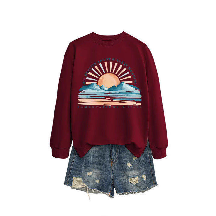 Kvinne sweatshirt med inspirerende soloppgang design og avslappet passform Skjora