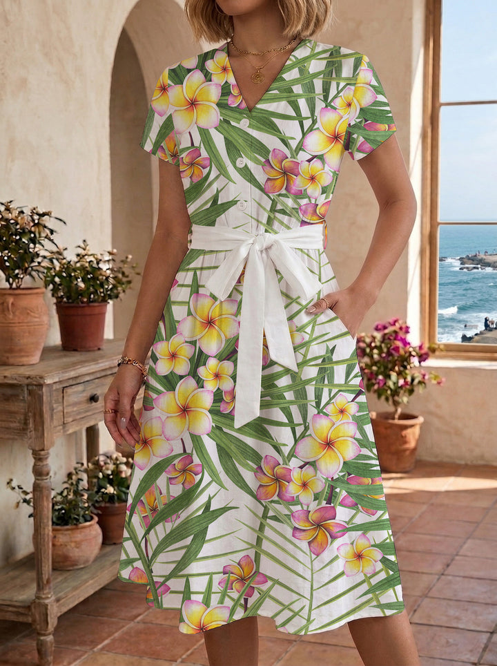 Dame Midi kjole med florale akcentuer og innsnevret snitt Skjora