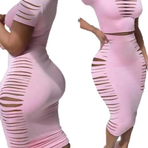Damer Figurtilpasset kjole med transparente cut-out-detaljer Skjora
