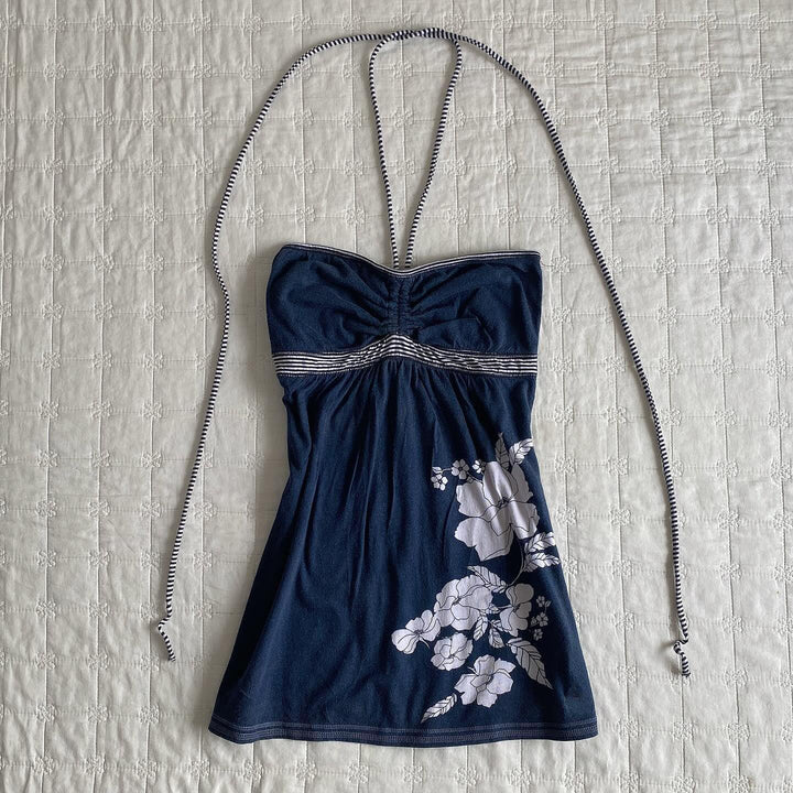 Dame strandtop med blomsterdesign og avskåret snitt Skjora