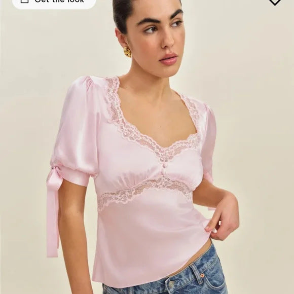 Ladies' satin blouse with pointed details Skjora