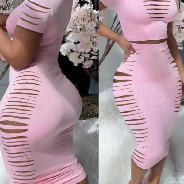 Damer Figurtilpasset kjole med transparente cut-out-detaljer Skjora