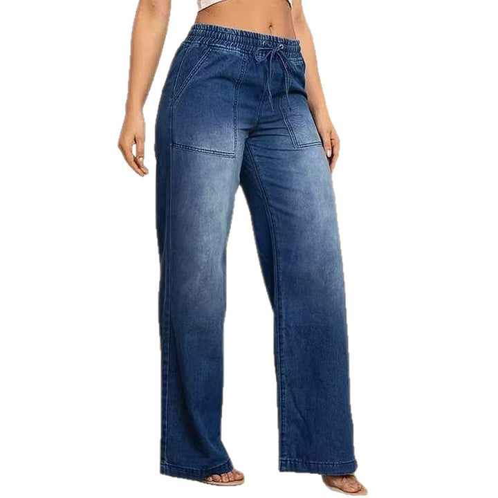 Kvinners vidde jeans med elastisk midje og trendy brukt utseende