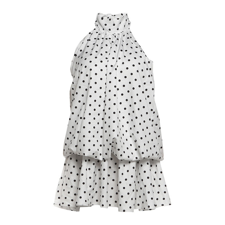 Dame Minikjole med leken polka-prikket mønster og elegant halterneck Skjora