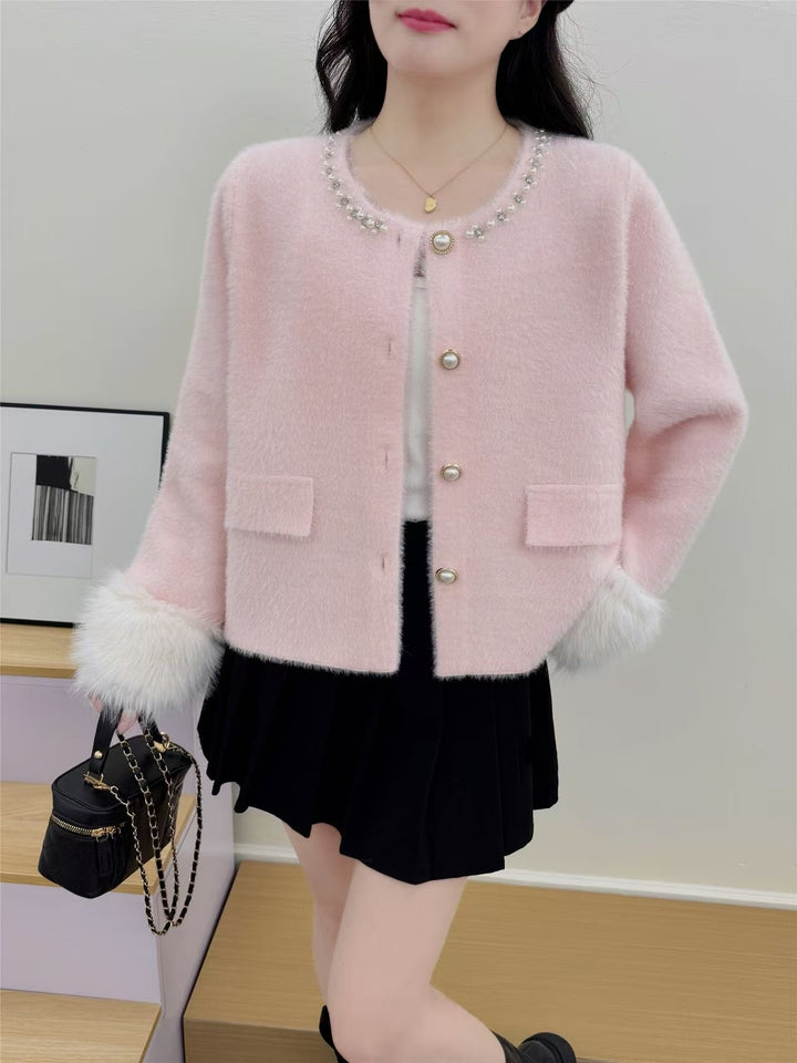 Damer elegant cardigan med perledekorasjon og fluffy ermer Skjora