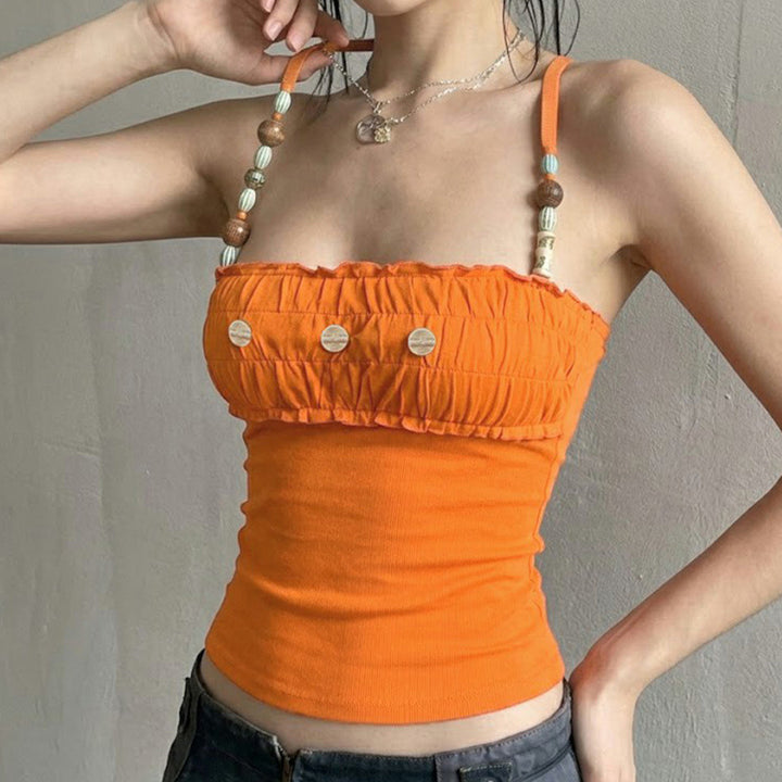 Damer spiss-crop-top med dekorative volanger og knappdetaljer Skjora