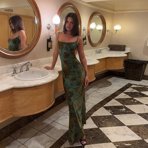 Kvinnes elegant maxi kjole med dyp bakhals og blomster mønster