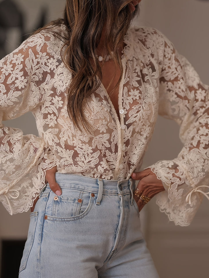 Dame gjennomsiktig bluse med blomsterbroderier og vide ermer Skjora