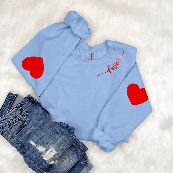 Dame sweatshirt med hjerte design og avslappet passform Skjora