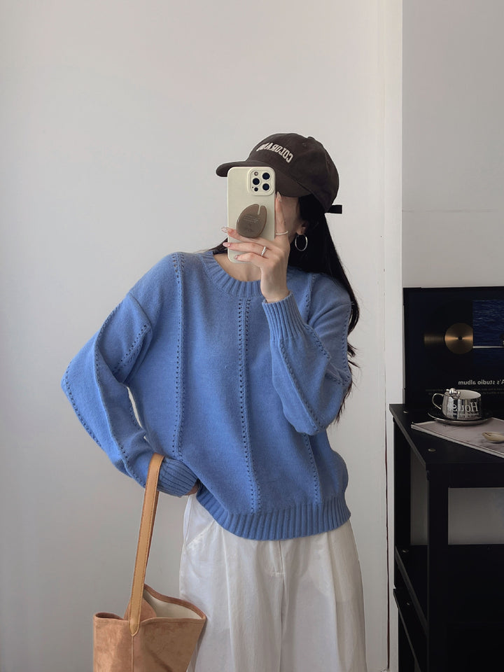 Kvinnes chunky strikkegenser med en feminin silhuett og strukturert design Skjora