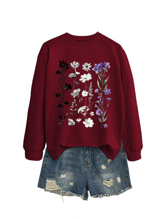 Dame sweatshirt med blomster grafisk design og myk innvendig fôr Skjora