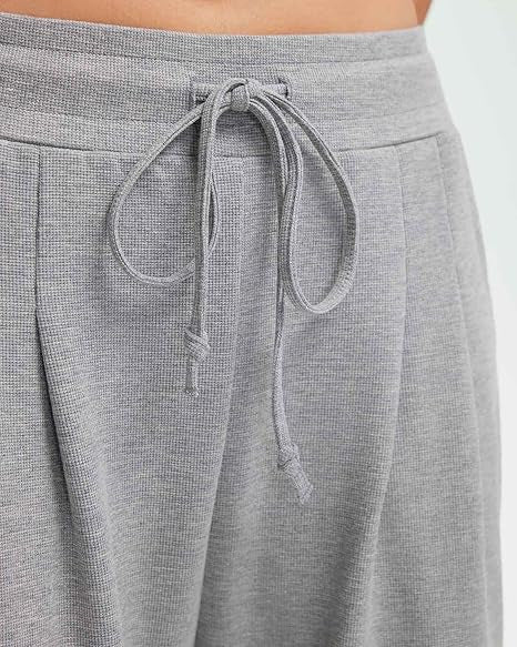 Uformelle baggy bukser for kvinner med knappdetaljer Skjora