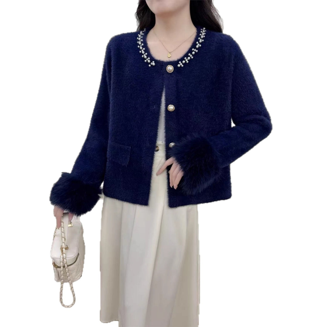Damer elegant cardigan med perledekorasjon og fluffy ermer Skjora