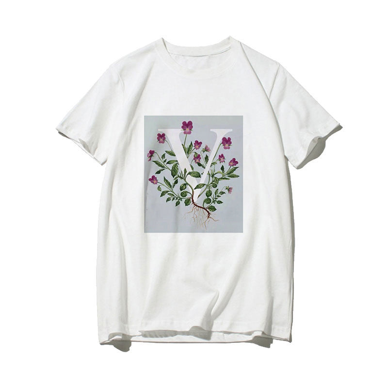 Dame T-skjorte med blomsterdesign og kreativt trykk Skjora