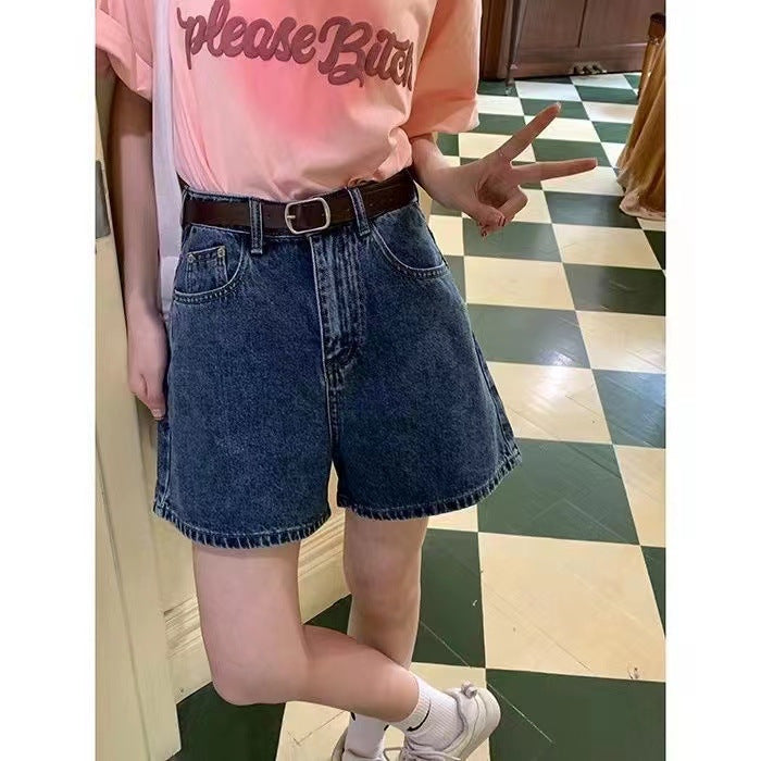 Kvinne denim shorts med høye lommer og løs passform