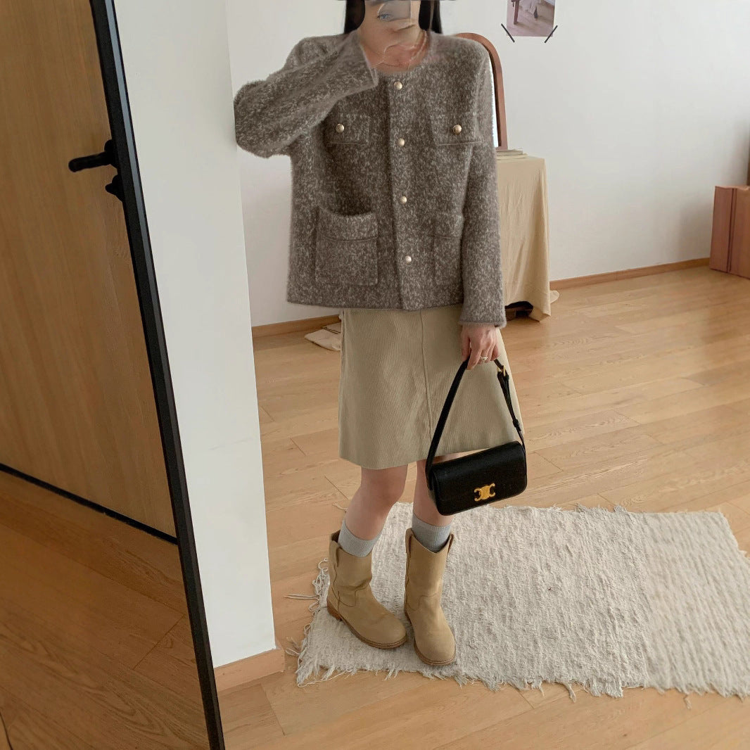 Kvinners koselige cardigan med knappe detaljer og lommeputer Skjora