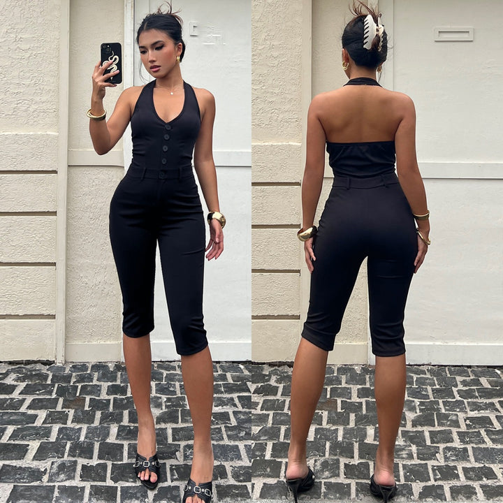 Dame jumpsuit med dyp V-hals og elegant knappdetalj Skjora