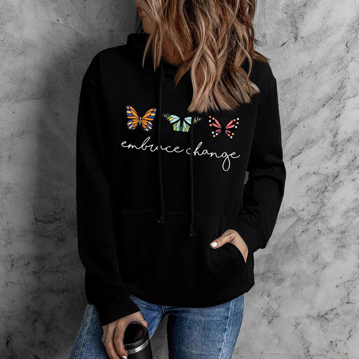 Dame hoodie med inspirerende sommerfuglmotiv og motiverende budskap Skjora