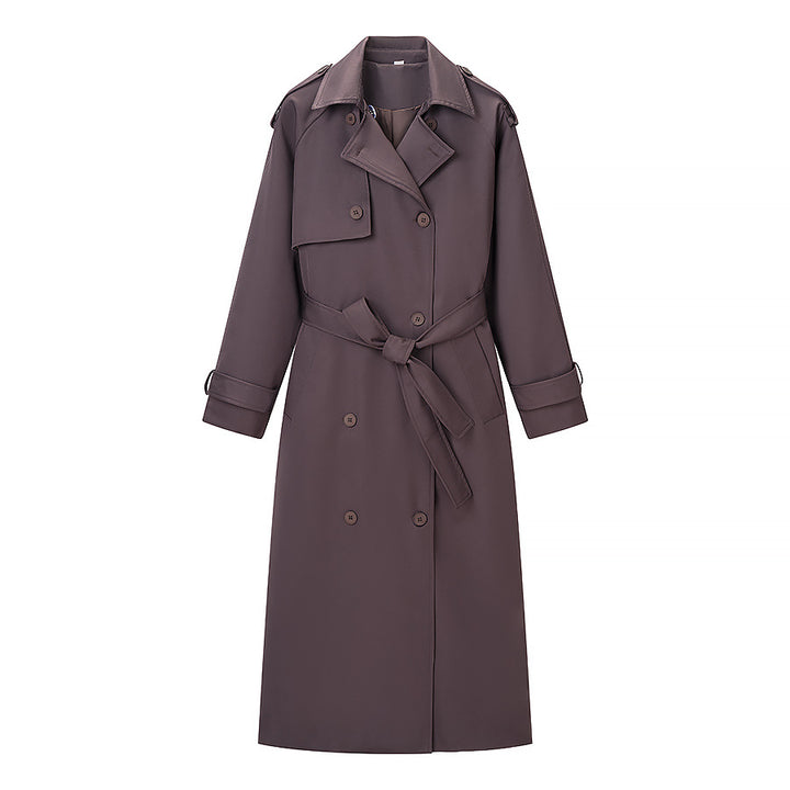 Kvinnens elegante trenchcoat med justerbart belte og fashionable krager Skjora