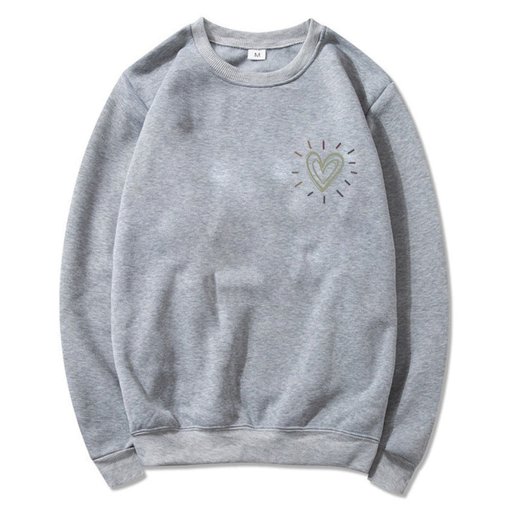 Dame Oversized Sweatshirt med søtt hjerte-motiv og avslappet snitt Skjora